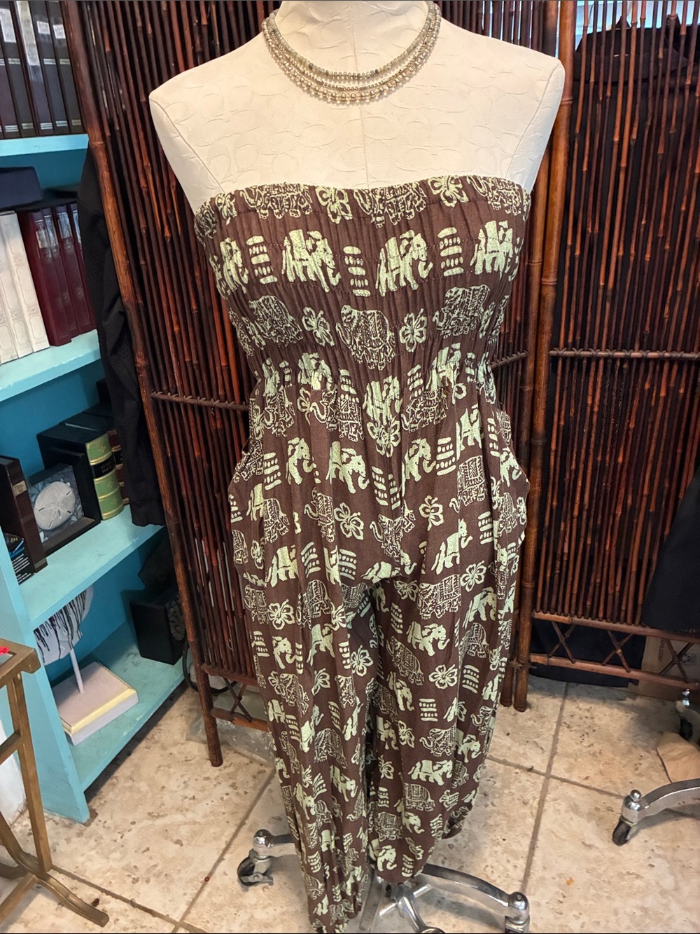 Strapless jumpsuit by Best Fashion. Made of 100% Rayon so a great feel.Size S.